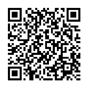 从市立医院赶来的救护车匆匆地把晕倒在地上的田同亮给抬走了二维码生成