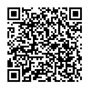 燃灯结印释放出来的金色佛光在眨眼间便化为了一个金色佛陀的虚影二维码生成