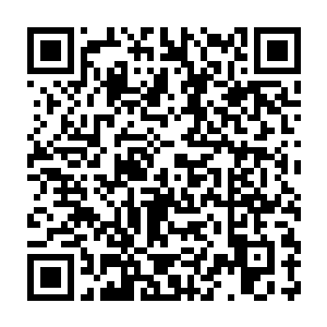 穿过黑炎城西部的贫民聚居区和城市工厂区边缘的那一片贫瘠地带二维码生成